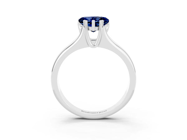 Platinum Heart Cut Blue Sapphire Solitaire Ring with Wide Band and Prong Setting