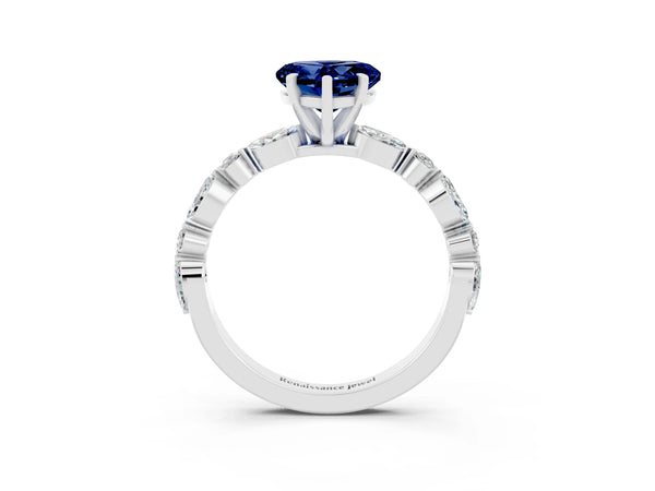 Platinum Heart Cut Blue Sapphire Ring with Marquise and Round  Side Stones and Four-Prong Setting