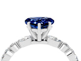 White gold Heart Cut Blue Sapphire Solitaire with Side Stones on a Pavé Band and Four-Prong Setting_4