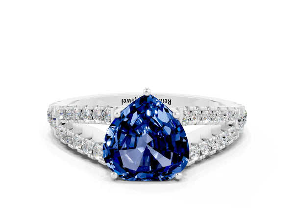 Platinum Heart Cut Blue Sapphire Split Shank Pavé Engagement Ring with Four-Prong Setting