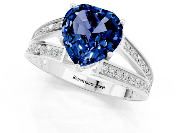 White gold Heart Cut Blue Sapphire Split Shank Ring with Pavé Band and Four-Prong Setting