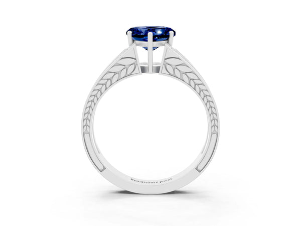 Platinum Heart Cut Blue Sapphire Split Shank Ring with Pavé Band and Four-Prong Setting