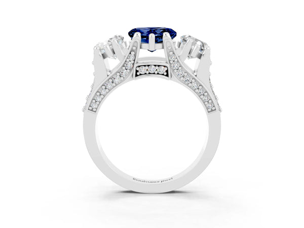 Silver Heart Cut Blue Sapphire Three-Stone Ring with Channel Set Band and Four-Prong Setting