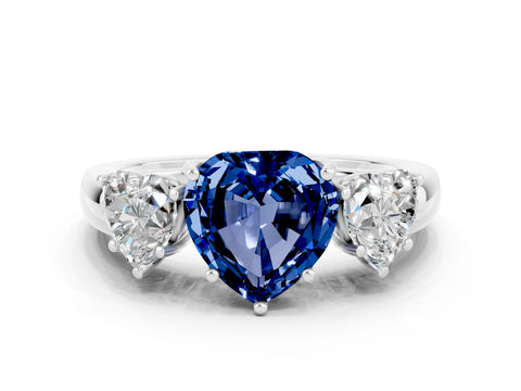 White gold Heart Cut Blue Sapphire Three-Stone Ring with Four-Prong Setting and Classic Band