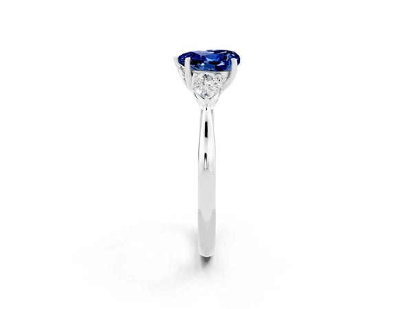 Silver Heart Cut Blue Sapphire Three-Stone Ring with Pear  Side Stones and Prong Setting