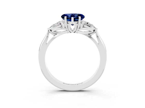 White gold Heart Cut Blue Sapphire Three-Stone Ring with Pear  Side Stones and Prong Setting