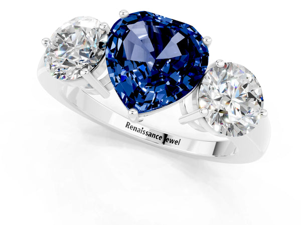 Platinum Heart Cut Blue Sapphire Three-Stone Ring with Prong Setting and Classic Band