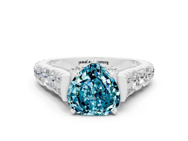 Silver Heart Cut Blue Topaz Classic Solitaire Ring with Pavé Band and Four-Prong Setting