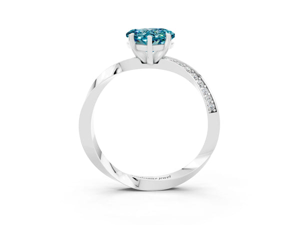 White gold Heart Cut Blue Topaz Engagement Ring with Side Stone Accents and Four-Prong Setting
