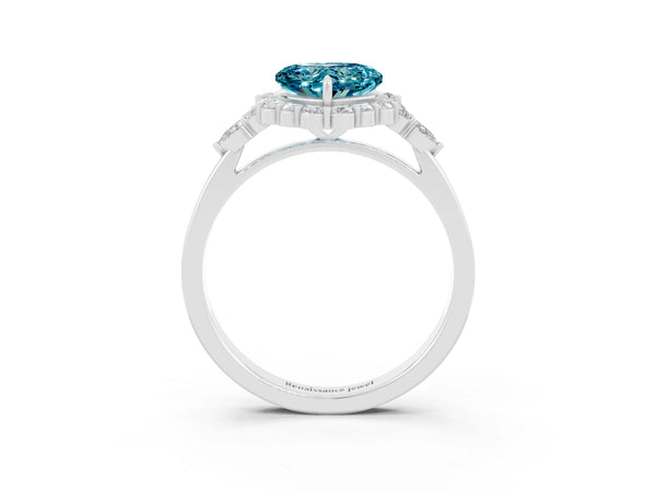 Silver Heart Cut Blue Topaz Halo Ring with Pear Side Stones and Prong Setting