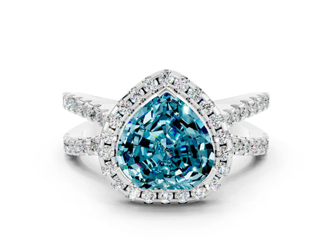 White gold Heart Cut Blue Topaz Halo Ring with Split Shank Pavé Band and Prong Setting