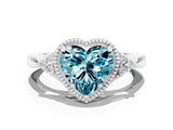 White gold Heart Cut Blue Topaz Halo Ring with Tapered Band and Four-Prong Setting