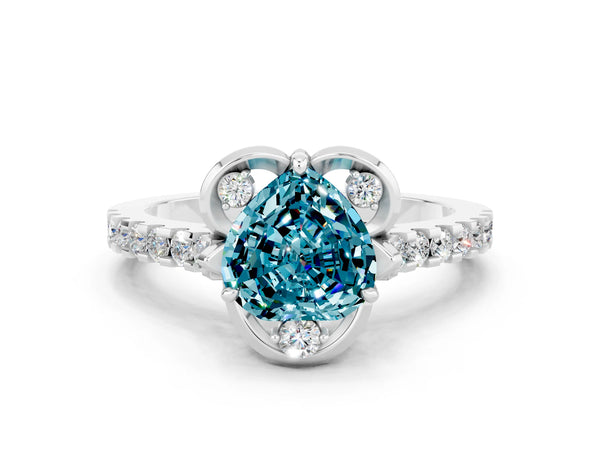 White gold Heart Cut Blue Topaz Ring with Pavé Band and Floral Prong Setting