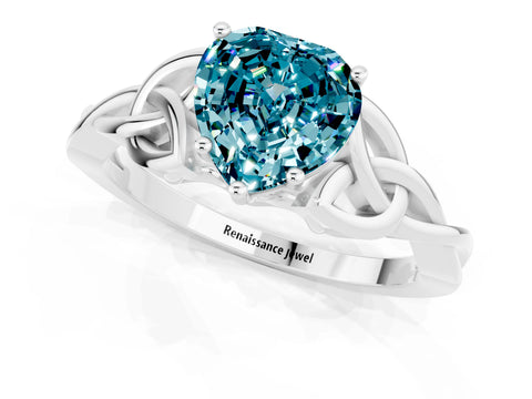 White gold Heart Cut Blue Topaz Solitaire Engagement Ring with Celtic Knot Band and Four-Prong Setting_1