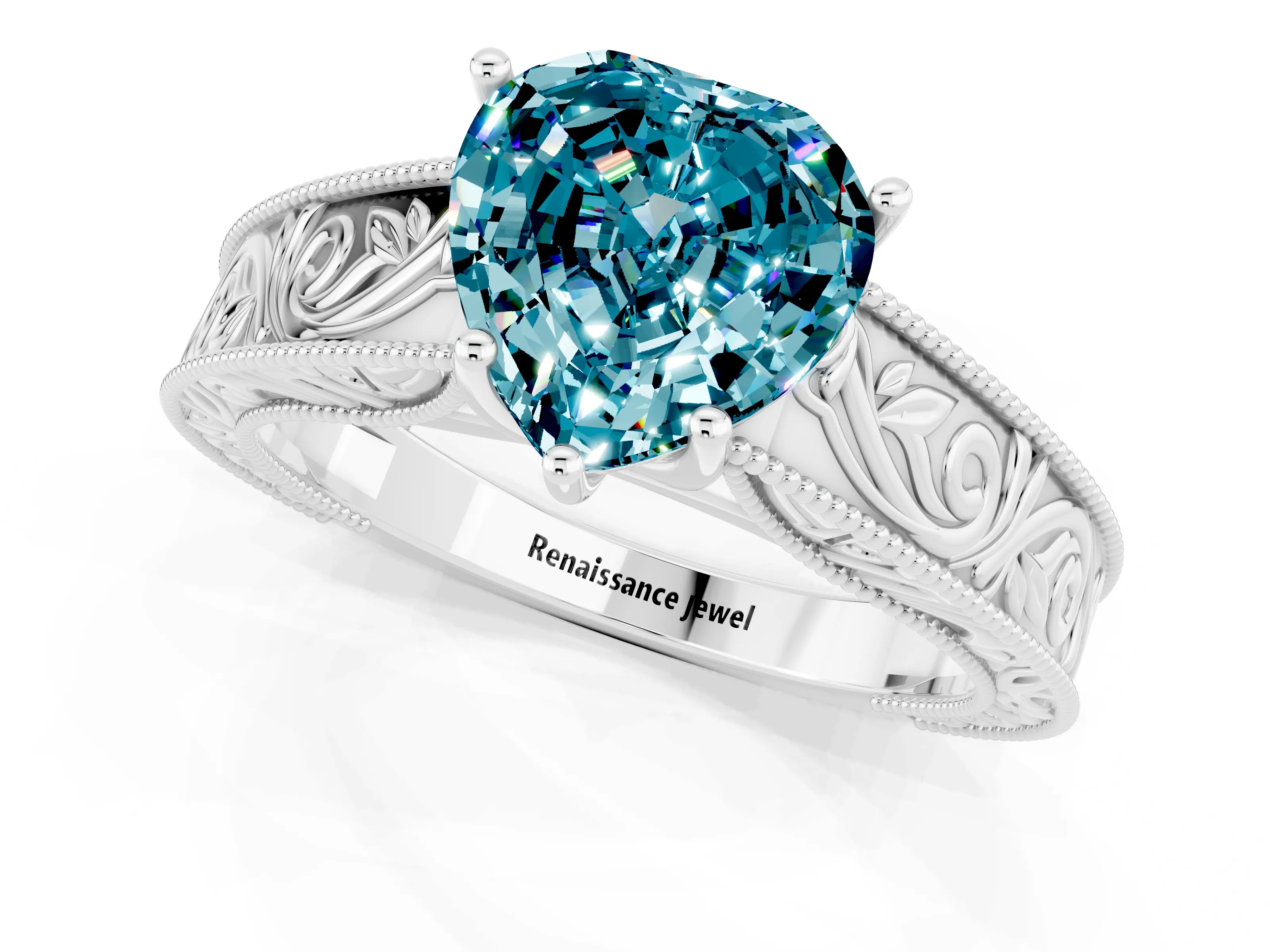 White gold Heart Cut Blue Topaz Solitaire Ring with Engraved Band and Four-Prong Setting_1