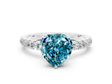 White gold Heart Cut Blue Topaz Solitaire Ring with Pavé Accents and Four-Prong Setting