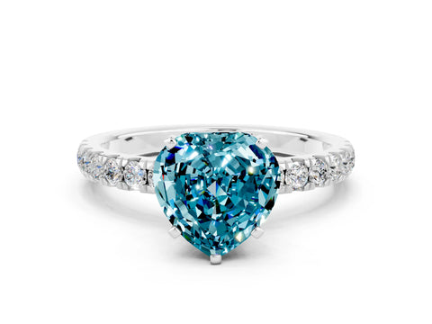 White gold Heart Cut Blue Topaz Solitaire Ring with Pavé Accents and Four-Prong Setting