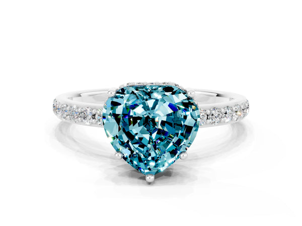 Platinum Heart Cut Blue Topaz Solitaire Ring with Pavé Band and Hidden Halo