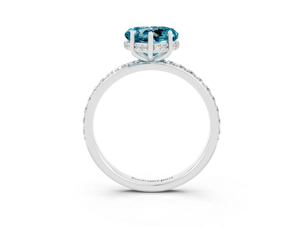 White gold Heart Cut Blue Topaz Solitaire Ring with Pavé Band and Hidden Halo
