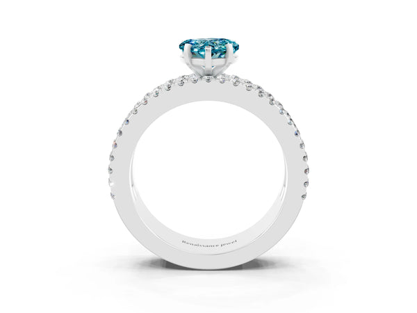 Silver Heart Cut Blue Topaz Solitaire Ring with Pavé and Channel Set Band