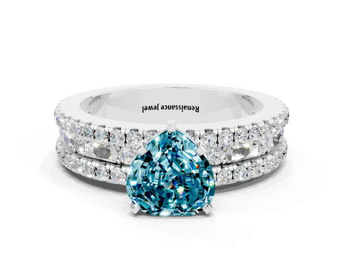 White gold Heart Cut Blue Topaz Solitaire Ring with Pavé and Channel Set Band