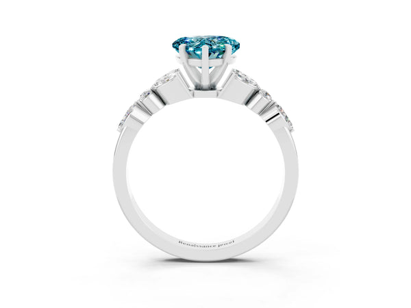 Silver Heart Cut Blue Topaz Solitaire Ring with Side Stones and Four-Prong Setting