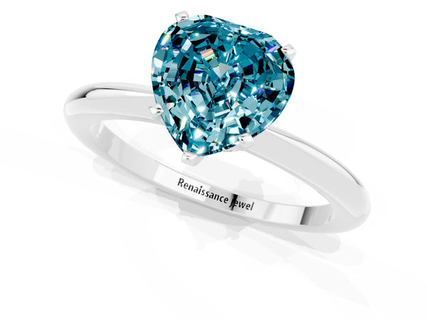 Platinum Heart Cut Blue Topaz Solitaire Ring with Six-Prong Setting and Classic Band