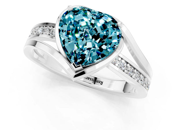 White gold Heart Cut Blue Topaz Solitaire Ring with Split Shank and Prong Setting