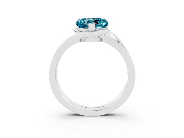 White gold Heart Cut Blue Topaz Solitaire Ring with Split Shank and Prong Setting