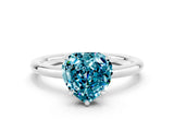White gold Heart Cut Blue Topaz Solitaire Ring with Thin Band and Four-Prong Setting