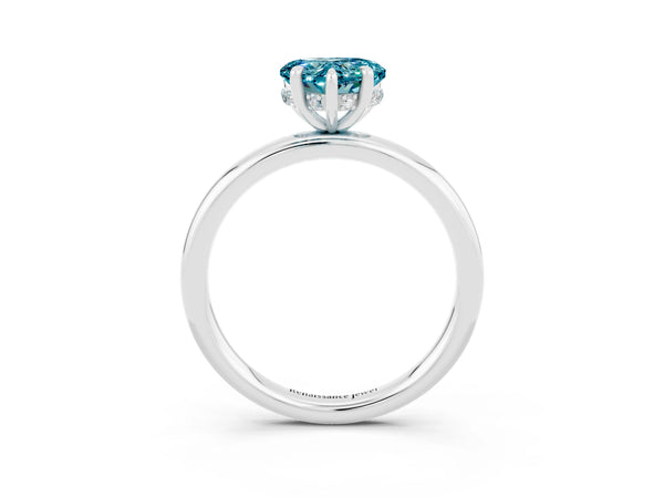 Silver Heart Cut Blue Topaz Solitaire Ring with Thin Band and Four-Prong Setting