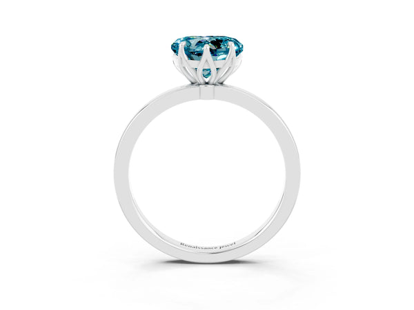 Platinum Heart Cut Blue Topaz Solitaire Ring with Thin Band and Prong Setting