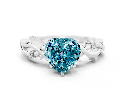 White gold Heart Cut Blue Topaz Solitaire Ring with Twisted Band and Prong Setting