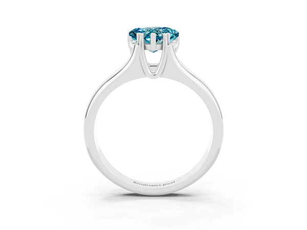 White gold Heart Cut Blue Topaz Solitaire Ring with Wide Band and Prong Setting