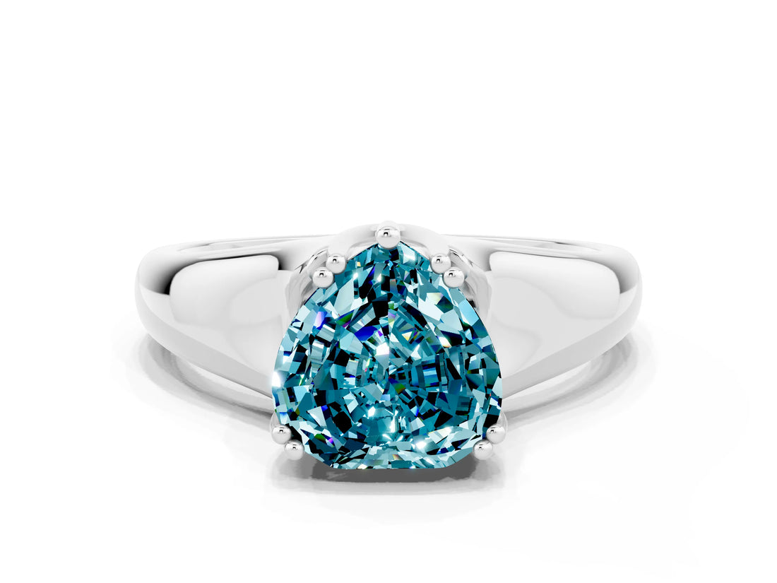 White gold Heart Cut Blue Topaz Solitaire Ring with Wide Band and Prong Setting
