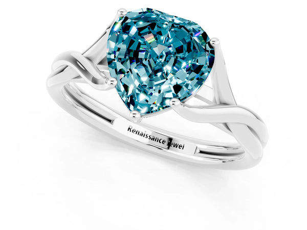 Silver Heart Cut Blue Topaz Solitaire Twist Band Prong Setting Ring
