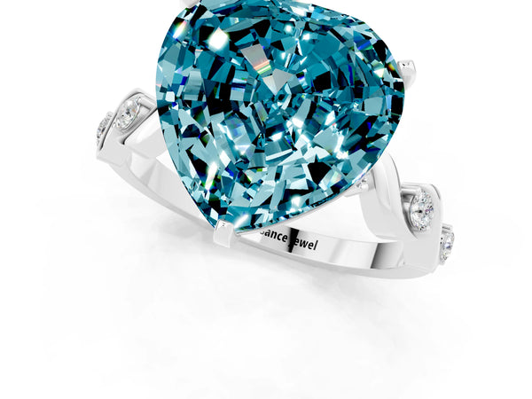Platinum Heart Cut Blue Topaz Solitaire Twisted Band with Round  Accents and Prong Setting