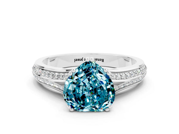 Platinum Heart Cut Blue Topaz Split Shank Engagement Ring with Pavé Band
