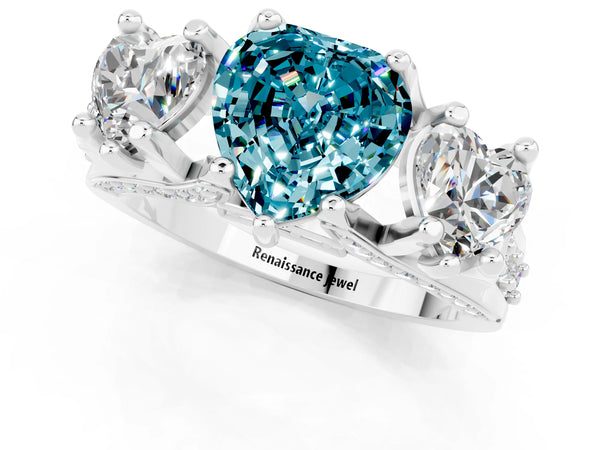 White gold Heart Cut Blue Topaz Three-Stone Ring with Channel Set Band and Four-Prong Setting