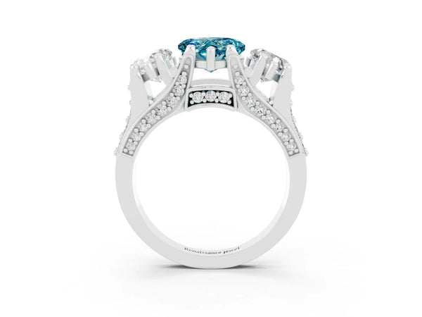 Platinum Heart Cut Blue Topaz Three-Stone Ring with Channel Set Band and Four-Prong Setting