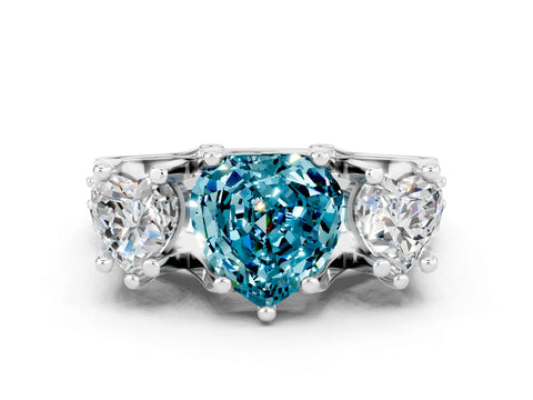 White gold Heart Cut Blue Topaz Three-Stone Ring with Channel Set Band and Four-Prong Setting