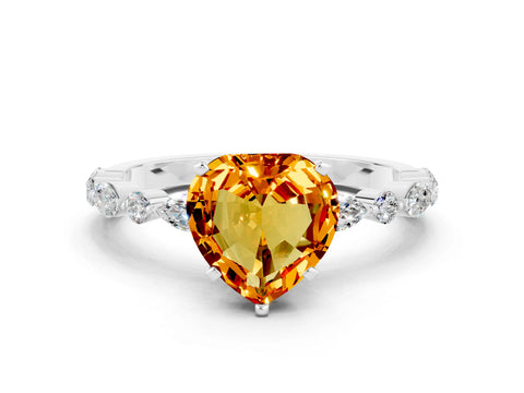 White gold Heart Cut Citrine Solitaire with Side Stones on a Pavé Band and Four-Prong Setting