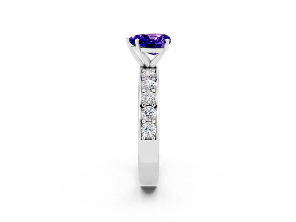 Platinum Heart Cut Tanzanite Engagement Ring with Channel Set Round  Band and Prong Setting