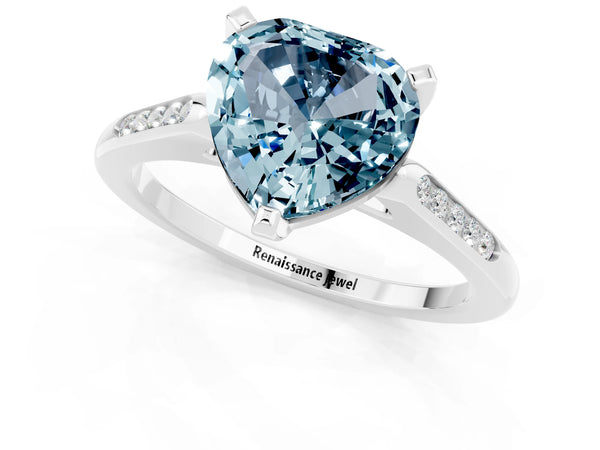 Silver Heart Cut Aquamarine Solitaire Ring with Channel Set Round Band and Prong Setting