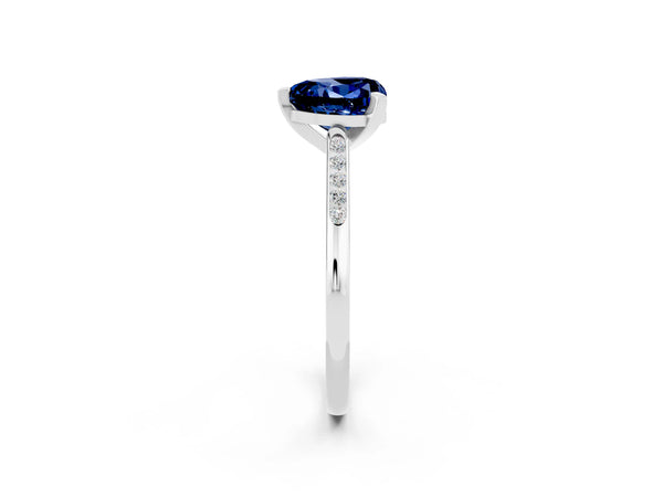White gold Heart Cut Blue Sapphire Solitaire Ring with Channel Set Round  Band and Prong Setting
