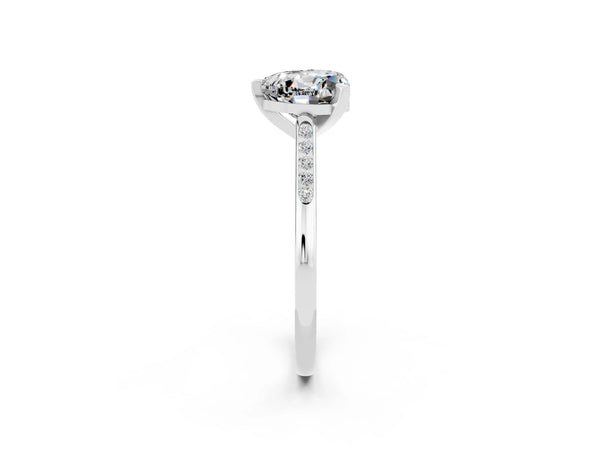 Platinum Heart Cut Moissanite Solitaire Ring with Channel Set Round Band and Prong Setting