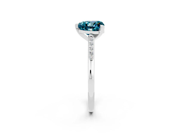 Silver Heart Cut Blue Topaz Solitaire Ring with Channel Set Round Band and Prong Setting