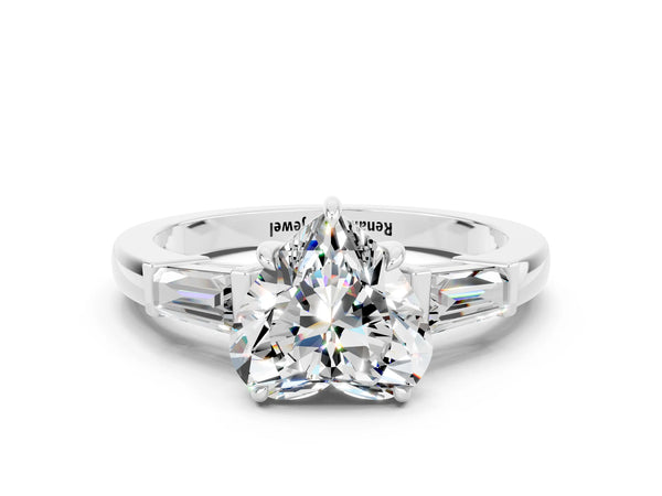 Platinum Heart Cut Moissanite Three-Stone Ring with Tapered Baguette Side Stones and Prong Setting
