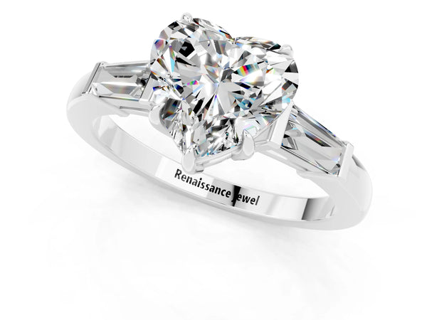 Platinum Heart Cut Moissanite Three-Stone Ring with Tapered Baguette Side Stones and Prong Setting