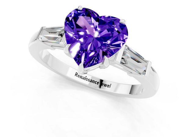 Silver Heart Cut Tanzanite Three-Stone Ring with Tapered Baguette Side Stones and Prong Setting